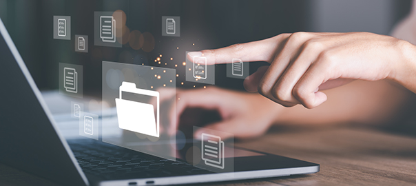 Businessman using laptop to access documents online,Document Man
