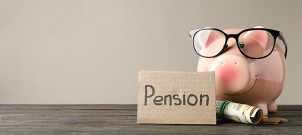 Piggy bank, money and inscription Pension against grey backgroun